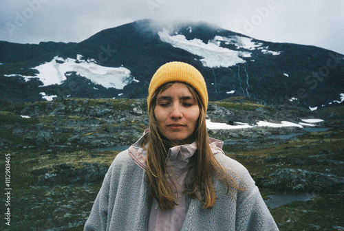 Woman with a mountain and glacier view in the background photo