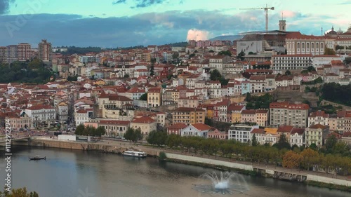 4K drone video footage of Coimbra city old town and university. Panoramic aerial cityscape of Coimbra university and Mondego River, Portugal