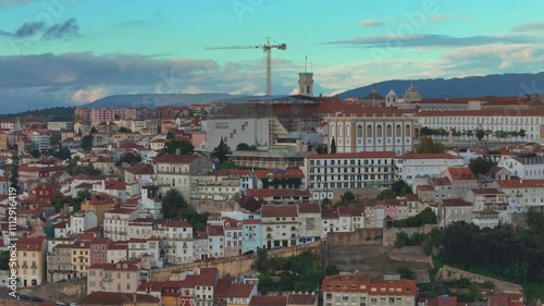 University of Coimbra. Aerial 4K drone video footage of Coimbra city old town on the hill. Panoramic cityscape, Portugal