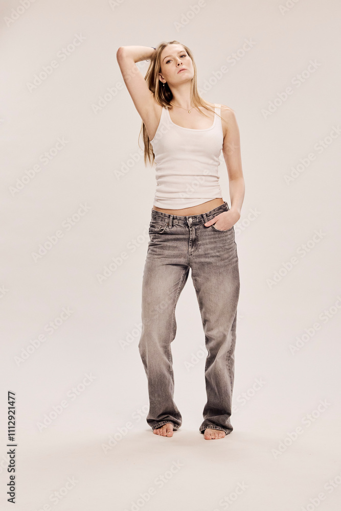 Portrait of beautiful young woman in a studio setting. Portrait of beautiful young woman in a studio setting.