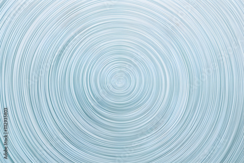 Abstract concentric circles background, light blue and white swirling pattern. Ideal for website banners, presentations, or design projects needing a calming, modern feel.