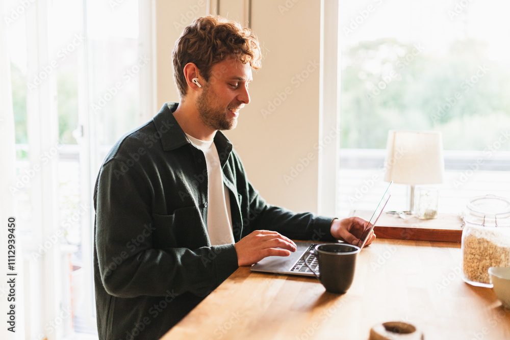 Man Working Remotely at Home Kitchen Table Man Working Remotely at Home Kitchen Table