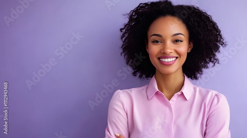 Portrait of happy smiling business woman in pink shirt on lila background