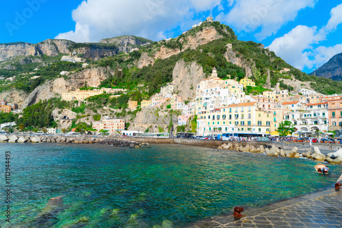 Fototapeta Naklejka Na Ścianę i Meble -  Amalfi old town and summer beach with umbrellas , Italy