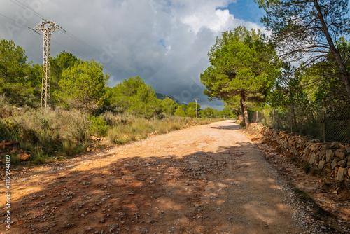 Kiesstrasse im Naturpark Serra d'Irta bei Alcossebre, Provinz Castellón, Autonome Gemeinschaft Valencia, Spanien photo