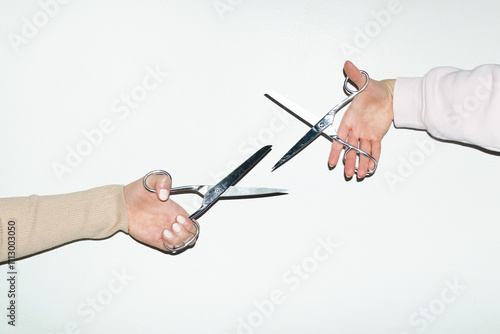 People playing rock paper scissors game with real objects with flash photo