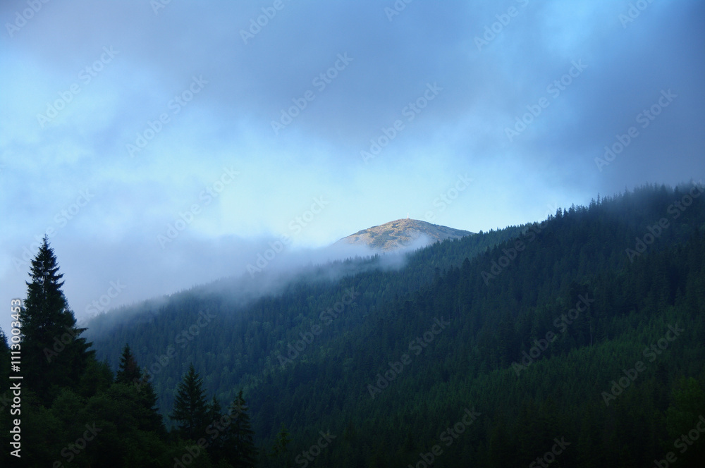 view of Mount Khomyak, in fog and clouds, Ukrainian Carpathians, Ukraine view of Mount Khomyak, in fog and clouds, Ukrainian Carpathians, Ukraine