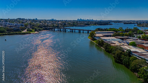 Panorama Aerial view above Rhodes with views to Meadowbank and Olympic park and Wentworth Point and Concord West with Parramatta River in Sydney NSW Australia photo