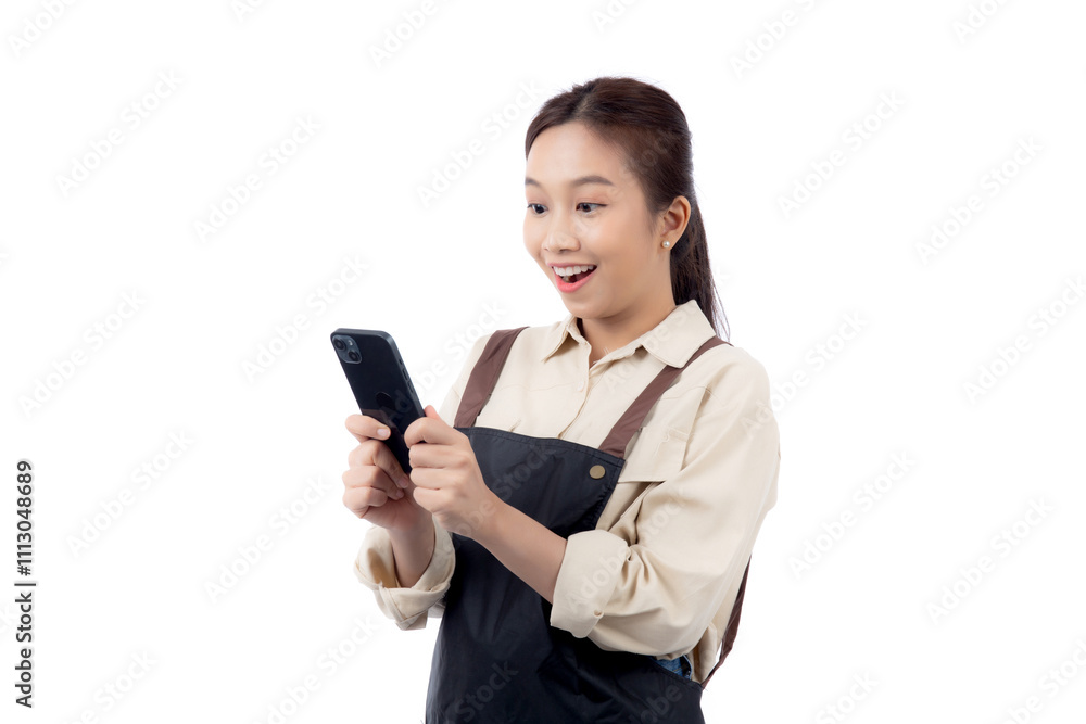 Portrait happy young asian barista woman in apron smiling while looking smart phone isolated white background, waitress or entrepreneur watching smartphone, small business or startup, waiter of cafe. Portrait happy young asian barista woman in apron smiling while looking smart phone isolated white background, waitress or entrepreneur watching smartphone, small business or startup, waiter of cafe.