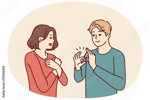 Deaf-mute man and woman are talking using sign language and demonstrating symbols with hands. Guy teaches girl sign language for concept of inclusiveness and socialization of people with disabilities