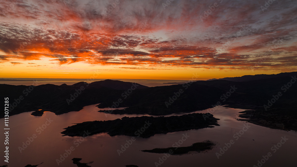 DECEMBER 2023, OJAI, CA - Drone view of Lake Casitas, Mountains and Pacific Ocean in Ojai CA.