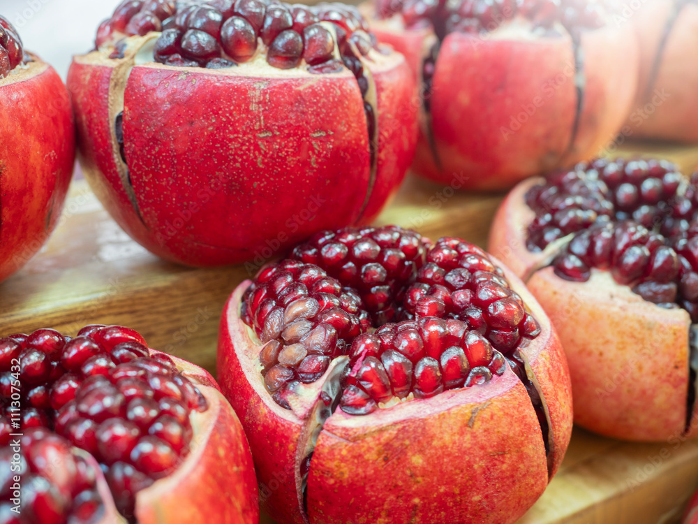 Pomegranate fruits pattern in nature background.