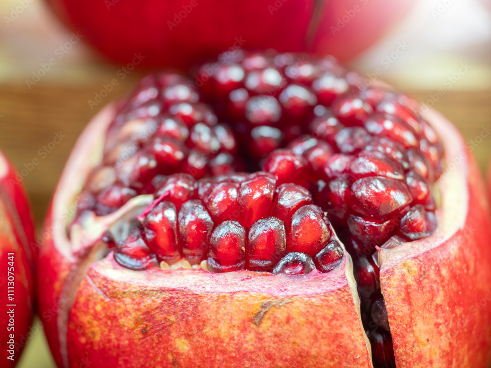 Pomegranate fruits pattern in nature background.