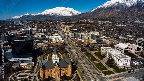 MARCH 2024, PROVO, UTAH - Provo Skyline and main street area is surrounded by snow capped Wasatch Mountains