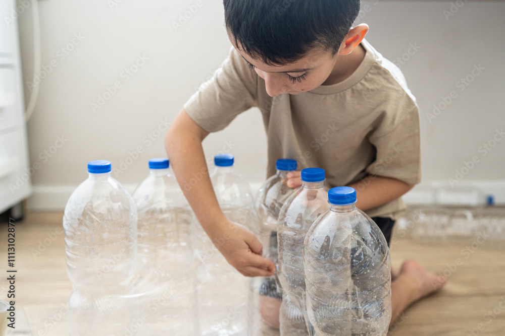 Child Crafting With Plastic Bottles For Eco-Friendly Project