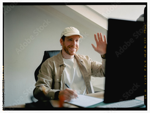 Analog film image of an art director entering a videoconference photo