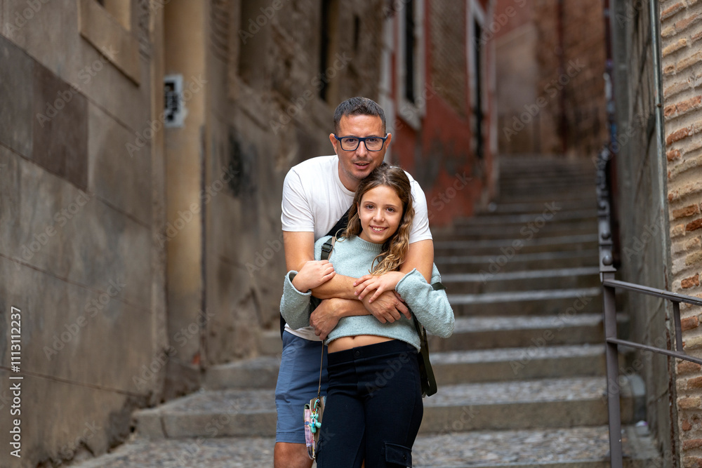 Father and Daughter Posing in a Narrow Alley Father and Daughter Posing in a Narrow Alley