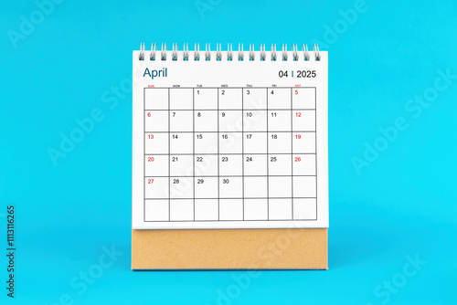 April 2025, Monthly desk calendar for 2025 year on Blue background.