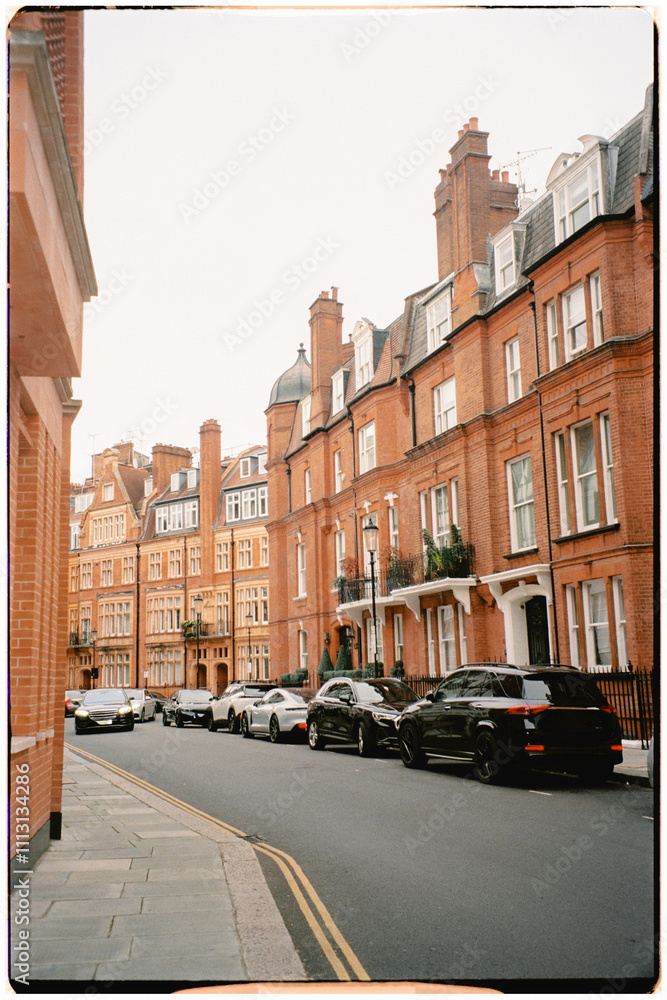 Film shot of luxury cars parked in front of fancy houses in London Film shot of luxury cars parked in front of fancy houses in London