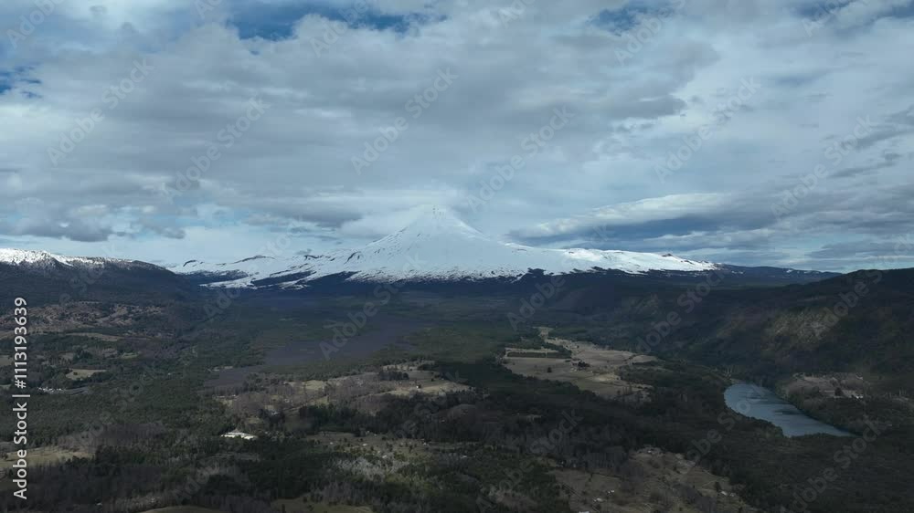 Majestic Snow-Capped Volcano with Clear Blue Sky Majestic Snow-Capped Volcano with Clear Blue Sky