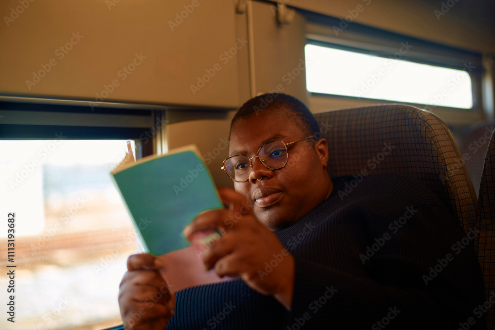 Cozy reading moment on a train during the day Cozy reading moment on a train during the day
