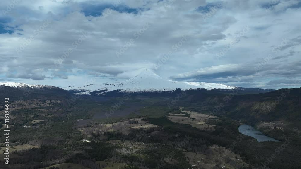 Majestic Snow-Capped Volcano with Clear Blue Sky Majestic Snow-Capped Volcano with Clear Blue Sky