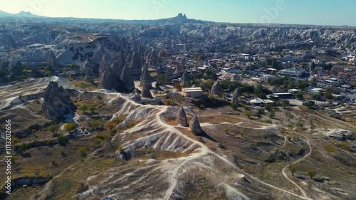 Aerial view of Goreme Town Center historic building with fairy chimney landscape near Goreme National Park in Cappadocia, Anatolia, Nevsehir Province, Turkey