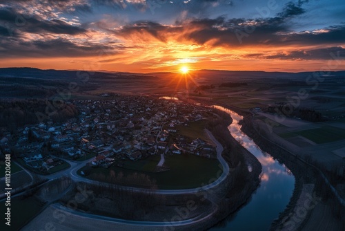 Wallpaper Mural Aerial view of a village at sunset with a river. Torontodigital.ca