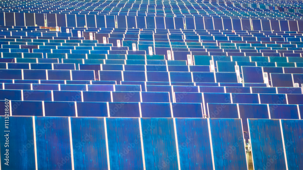 Naklejka premium Aerial of Expansive Solar Farm Grid in Nevada