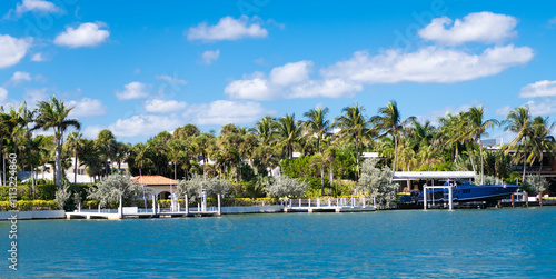 Residential architecture. Residential apartment in waterfront city. City waterfront with house. Vacation building in summer. Luxury waterfront house. Hotel building architecture. Resort area panorama photo