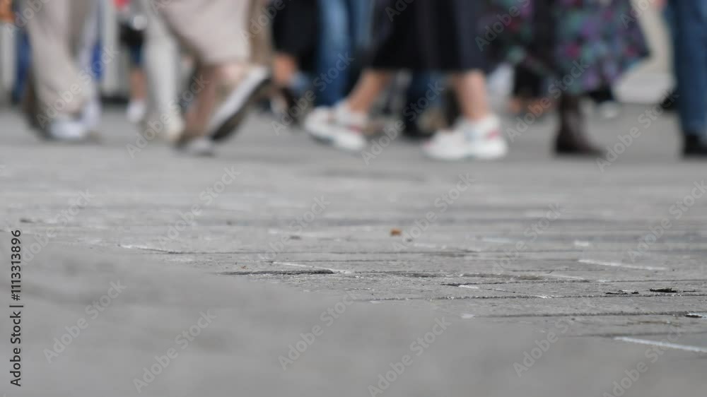 A Busy Urban Scene Featuring Pedestrians Walking Happily on the Sidewalk A Busy Urban Scene Featuring Pedestrians Walking Happily on the Sidewalk