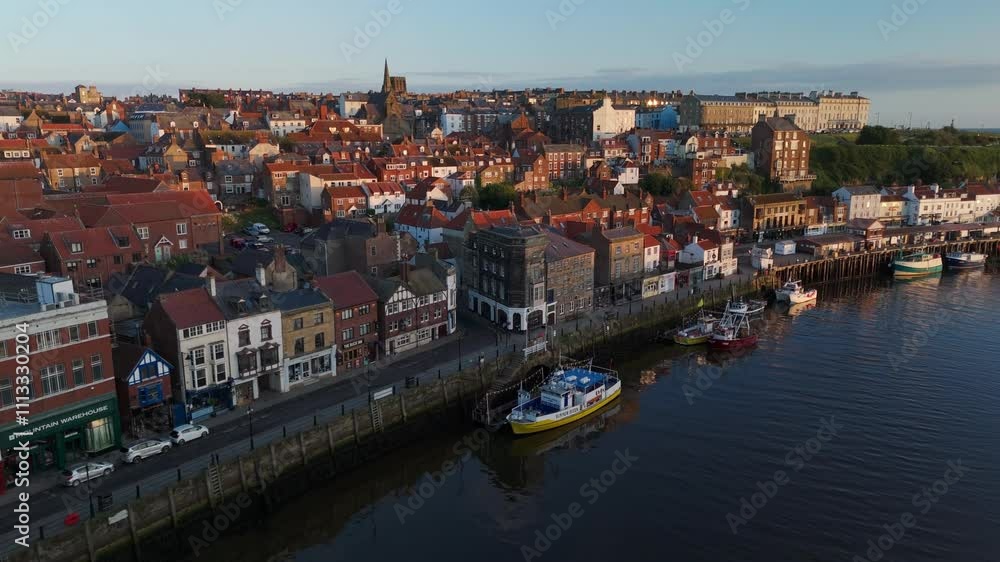 Wide Angle Drone Shot over Pier Road and Harbour in Whitby UK Wide Angle Drone Shot over Pier Road and Harbour in Whitby UK