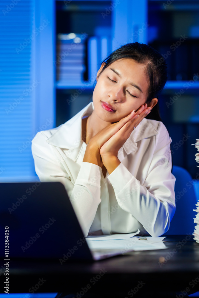 Asian business women often work late into the night, overwhelmed with stress, headaches, and migraines.Sitting for long hours at their desks causes office syndrome,leading to neck,shoulder,back pain Asian business women often work late into the night, overwhelmed with stress, headaches, and migraines.Sitting for long hours at their desks causes office syndrome,leading to neck,shoulder,back pain