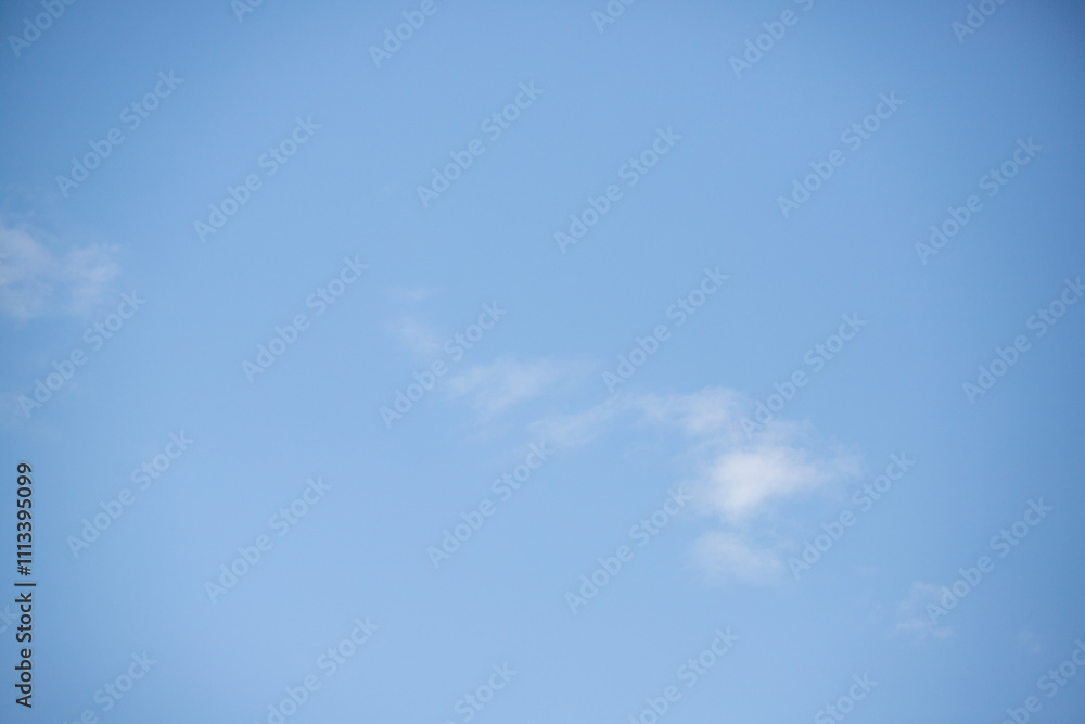 Sky background with clouds. White clouds against a blue sky. Sky background with clouds. White clouds against a blue sky.