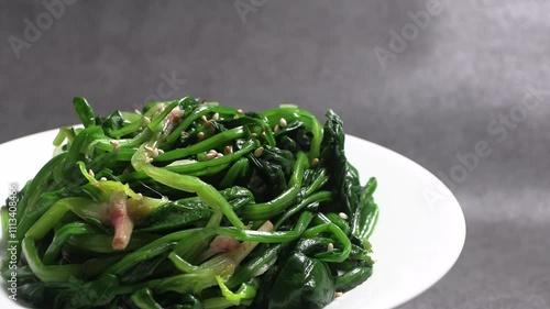 Spinach greens blanched in boiling water. Korean style vegetable side dish.
