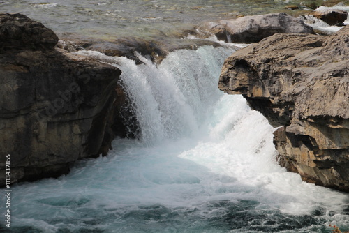 Water Rushes Over The Elbow Falls, Kananaskis Country, Alberta photo