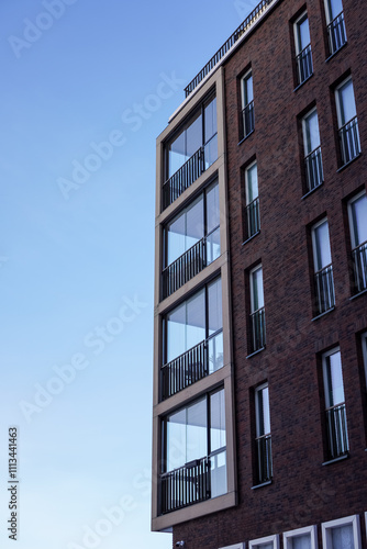 Modern residential building in Noblessner, Tallinn with stylish glass balconies in 2024 photo