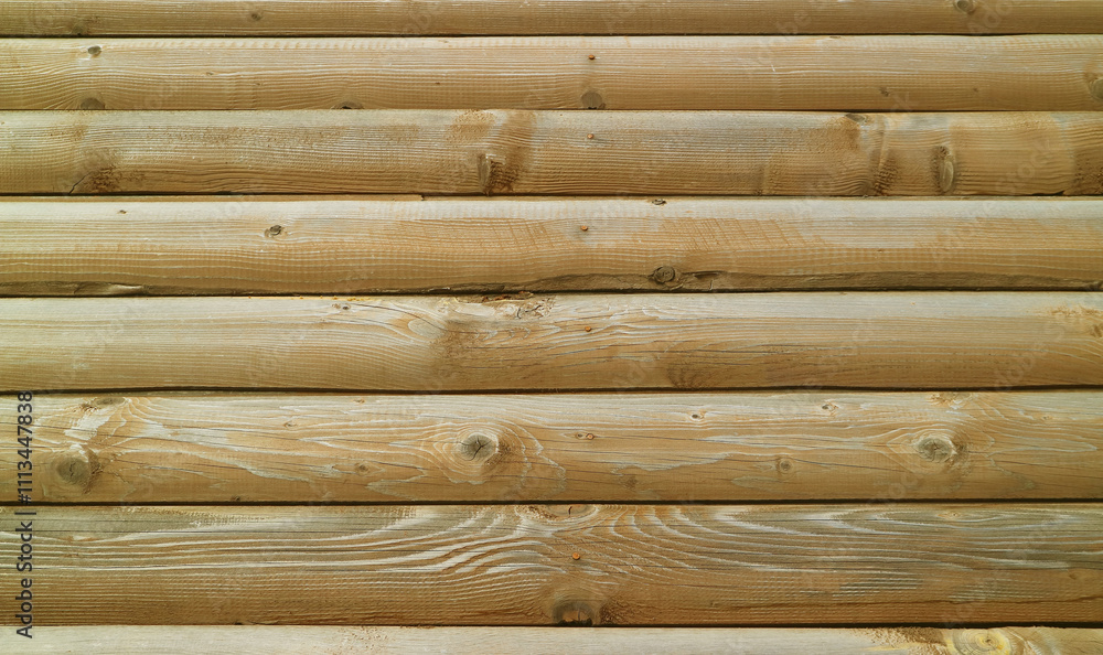 Front view of wooden log wall for background and wallpaper Front view of wooden log wall for background and wallpaper