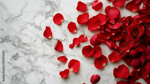 Elegant arrangement of scattered red rose petals on a polished white marble surface. Perfect for romantic, luxury, and floral compositions