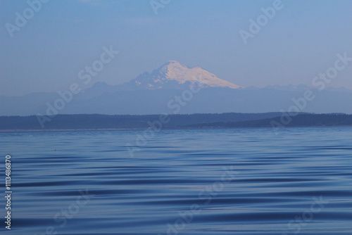 A mountain over a bay.