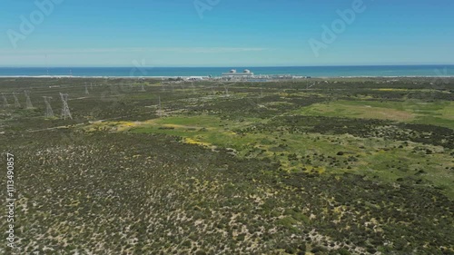 Koeberg Nuclear Power Station surrounded by green vegetation, aerial view photo