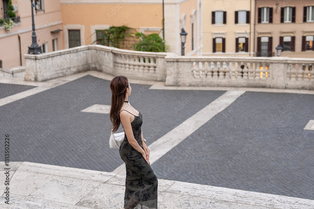 Fototapeta premium Woman enjoy view of Spanish steps (piazza di spagna) in Rome, Italy.