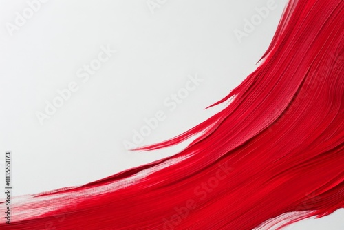 Bright red hair flowing gracefully across a white background in a striking vi...