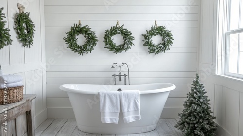 Elegant bathroom adorned with holiday wreaths and a festive tree during winte...