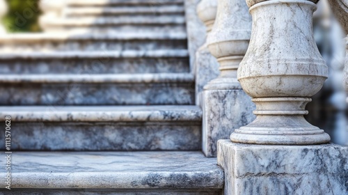 Selective focus on a baluster of a weathered gray stone staircase leads the eye up the marble stairs in a contemporary architectural setting, with ample copy space available. photo