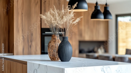 Modern kitchen with marble countertop and wooden accents creating a cozy atmo...
