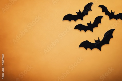 Bats flying against a sunset colored sky in the evening twilight hours