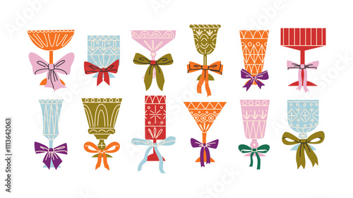 Set of festive glasses for alcoholic cocktails of different forms. Decorative elegant faceted glasses on legs with ribbons and bows. New Year's stickers of the holiday and fun. Container for drink