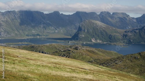 Slow motion grass and mountains 