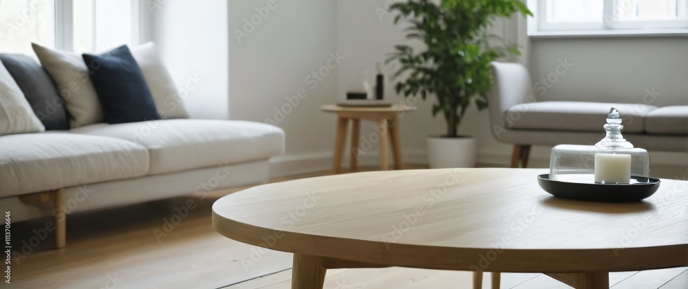 Centered view of a light oak wood tabletop with a bright softly blurred Scandinavian living room in the background Centered view of a light oak wood tabletop with a bright softly blurred Scandinavian living room in the background